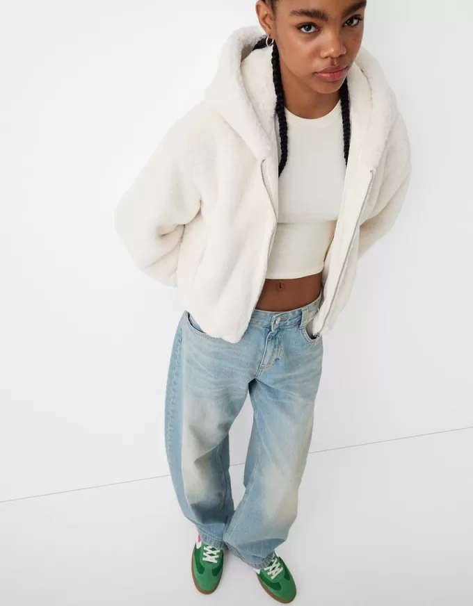 Quilted jacket with faux fur hood Quilted jacket with faux fur hood