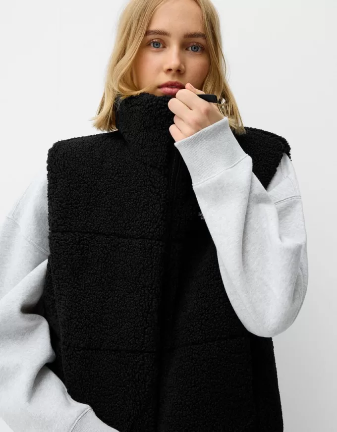 Reversible faux shearling vest