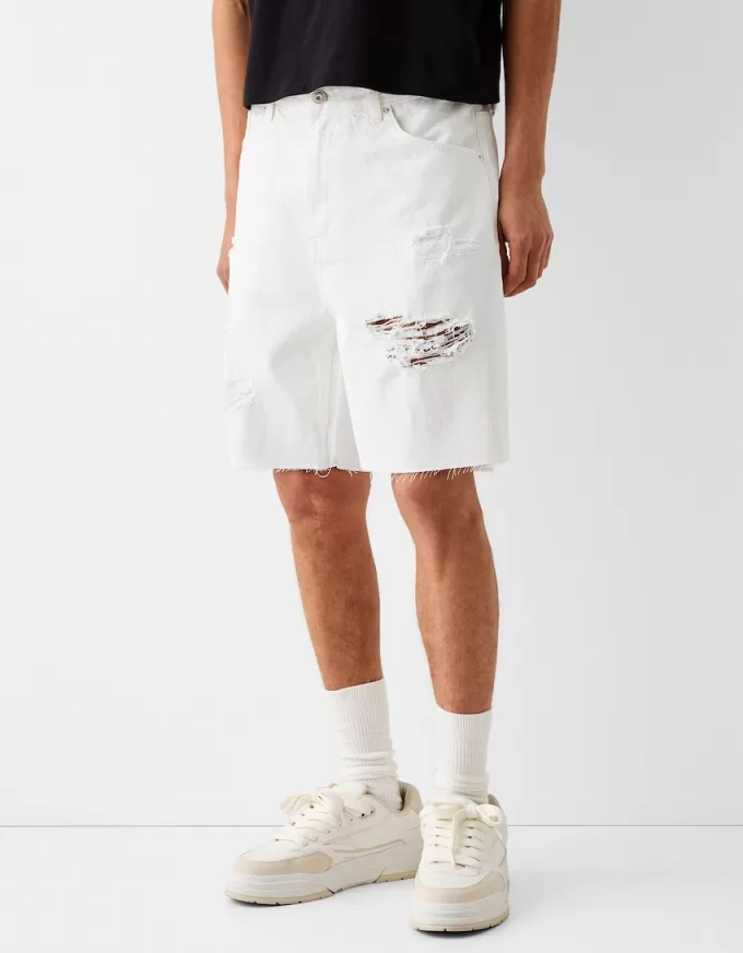 Ripped denim Bermuda shorts Ripped denim Bermuda shorts