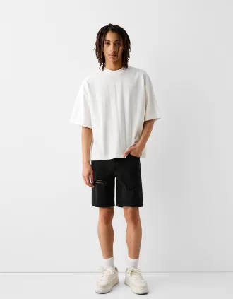 Ripped denim Bermuda shorts