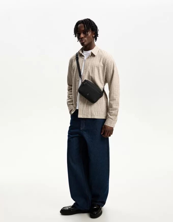 Rubberized monogram messenger bag Rubberized monogram messenger bag