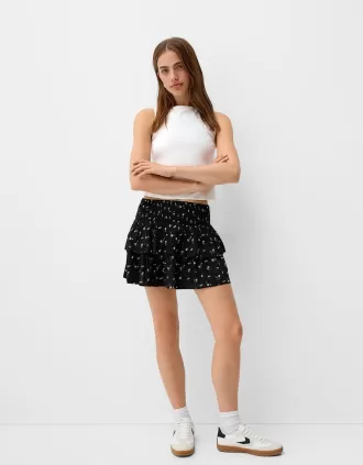Ruffled mini skirt with elastic waist