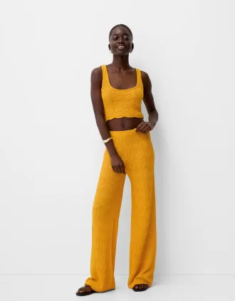 Rustic open knit flared pants