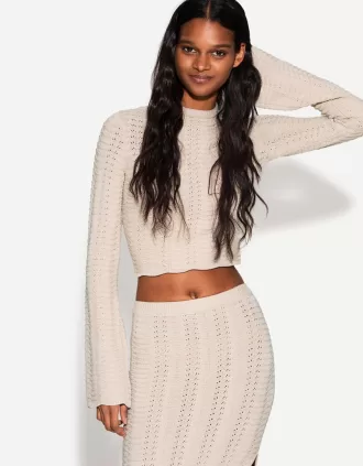 Rustic open knit turtleneck sweater