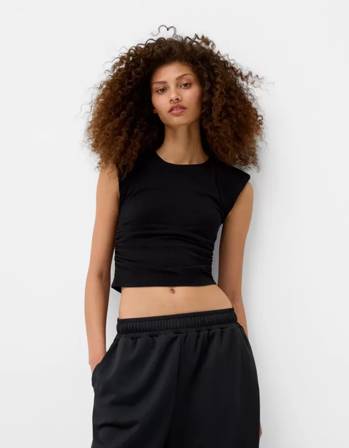 Short sleeve T-shirt with shoulder pads Short sleeve T-shirt with shoulder pads