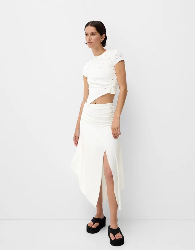 Short sleeve asymmetric T-shirt with studs Short sleeve asymmetric T-shirt with studs