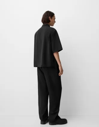 Short sleeve boxy fit crossed shirt with buckle