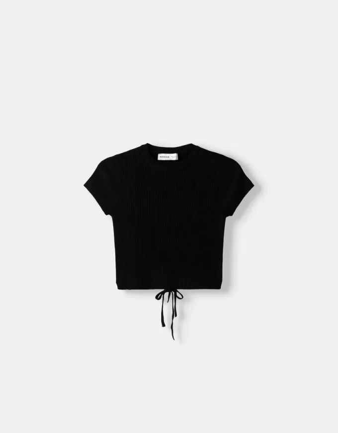 Short sleeve cut-out sweater with ties Short sleeve cut-out sweater with ties