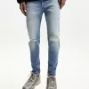 Super skinny ripped jeans