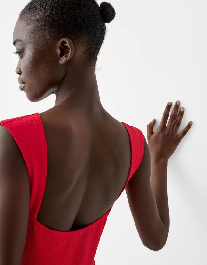 Textured mini dress with open back Textured mini dress with open back