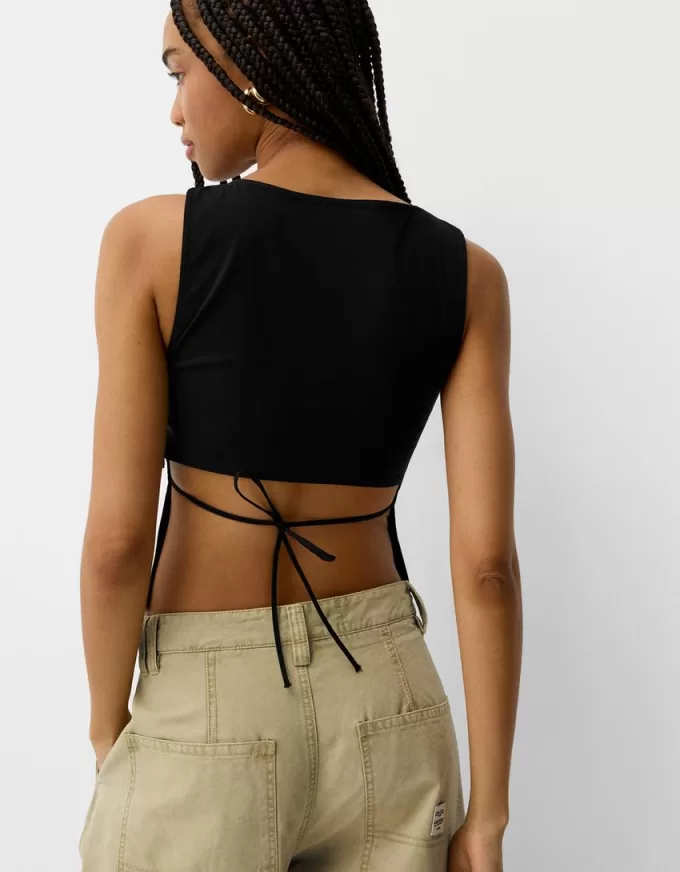 Top with tied detail at the back Top with tied detail at the back