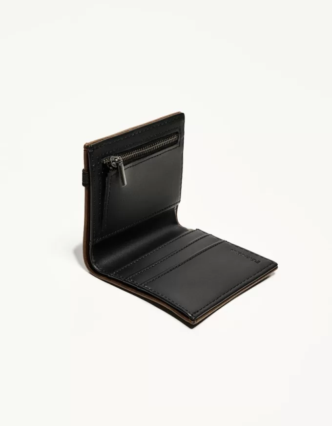 Wallet with elastic closure Wallet with elastic closure