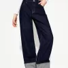 Wide-leg ’90s jeans with turn-up hems Wide-leg ’90s jeans with turn-up hems