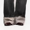 Wide-leg ’90s jeans with turn-up hems Wide-leg ’90s jeans with turn-up hems
