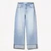Wide-leg ’90s jeans with turn-up hems