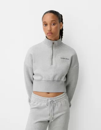 Zipped sweatshirt with embroidery